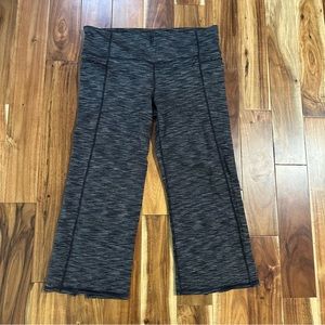 Athleta Capri’s with back slit detail on legs. Size Large.